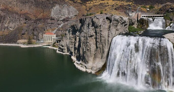 Twin Falls Idaho Snake River Waterfall slow pan. Waterfall on the Snake River, Idaho. Irrigation and hydroelectric power stations is economic impact to west. higher than Niagara Falls. Travel.