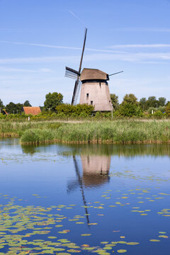 Traditional windmill at Molenkade Hoornse Vaart in North Holland in The Netherlands