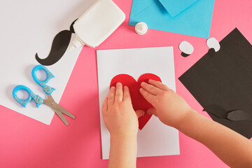 child makes a card for father's day, red paper heart with mustache, card for dad step by step...