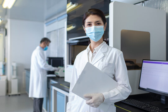 Portrait of female researcher in laboratory