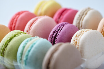 tasty macaroons on the white background