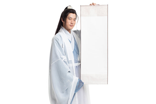 Young man in ancient costume holding a blank scroll