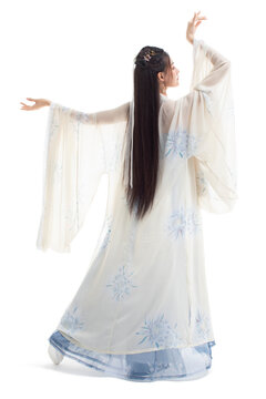 Beautiful young woman in ancient costume dancing