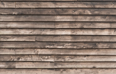 Rustic wood cladding texture, horizontal unpainted old wood planks background