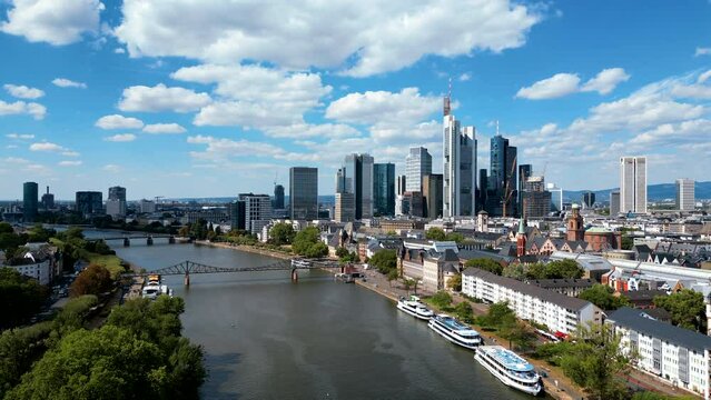 Aerial drone view of Frankfurt city, Main river and bridge, business centres and skyscrapers, Germany