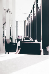 Interior of cozy luxury restaurant with view of the modern city
