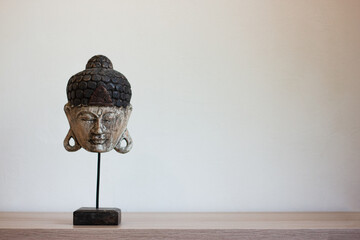 Ancient Buddha head statue as a home decor
