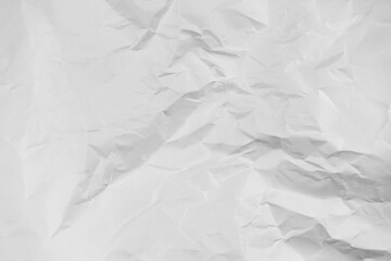 White crumpled paper texture background, clean white wrinkled paper, top view.