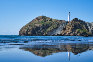 Fototapeta na wymiar Castlepoint lighthouse reflections, New Zealand