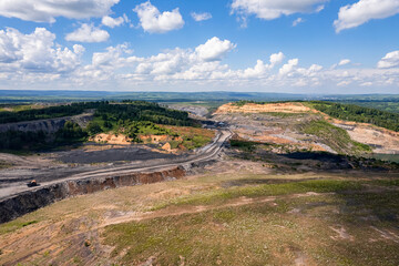 Fototapeta na wymiar Open pit mine, extractive industry for coal, top view aerial drone
