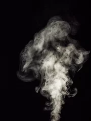 Fototapeten White smoke on a black background, rising in balls as an abstract effect © photostory