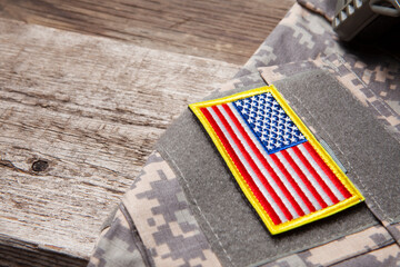 USA military uniform on old wooden table. Memorial Day or Veterans day concept.