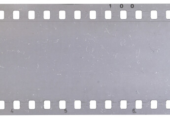 Strip of old celluloid film with dust and scratches on transparent background