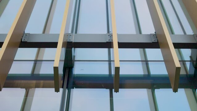 Modern architectural window frame close up details of steel and aluminum glass curtain wall construction