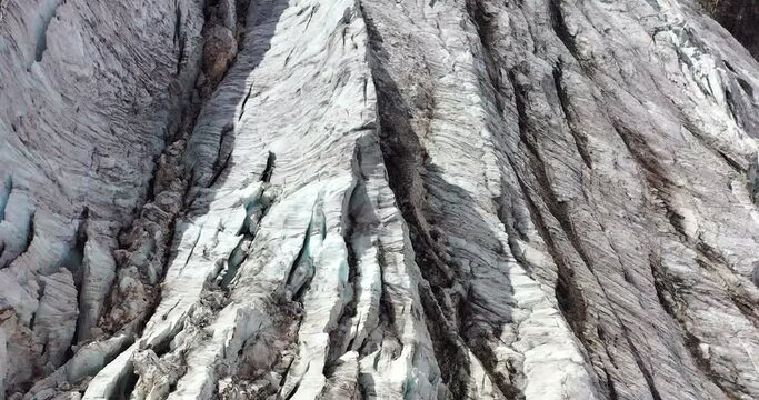 Drone flight over the slowly dying Steingletscher in the Sustenpass region of the Swiss Alps at 2'800m in Switzerland.