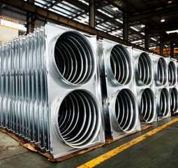 Hardware equipment stacked in large factory warehouse
