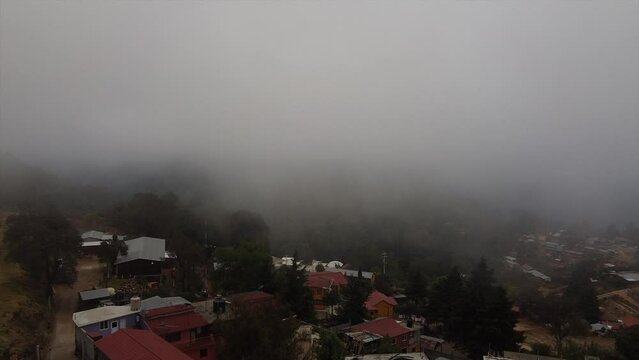 Aerial view of San Jose del Pacifico in Sierra de Juarez, Oaxaca. Clouds in the background.