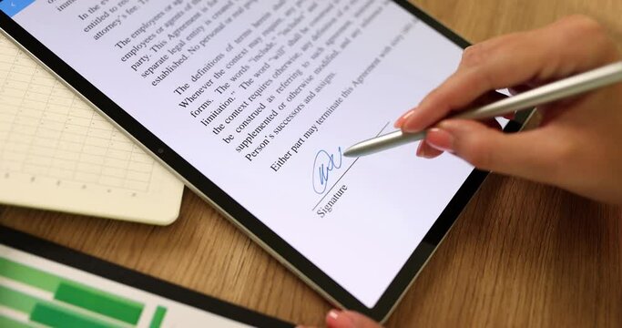 Businesswoman putting electronic signature on digital tablet on document closeup 4k movie slow motion