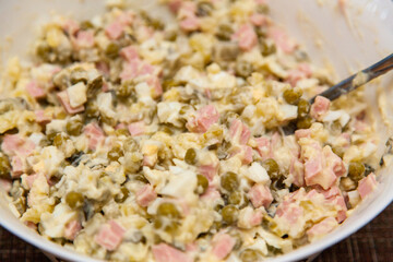 Russian salad Olivier close-up. A traditional Russian dish on the New Year's menu