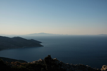 Fototapeta na wymiar Panoramic view of the Aegean Sea and ancient ruins of the fortification of Paleokastro in Ios Greece