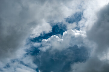 Dramatic landscape with dark blue sky and clouds