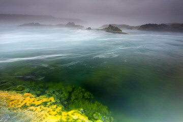 waves crashing on rocks