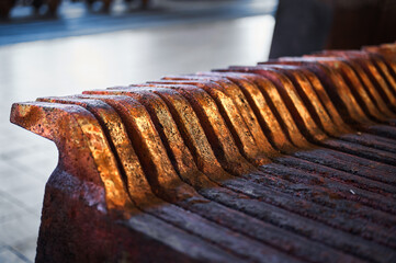 Texture of copper anode ingots in old metal melting workshop