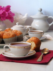 Cupcakes with a cup of tea