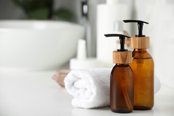 Different personal care products on countertop in bathroom, closeup. Space for text