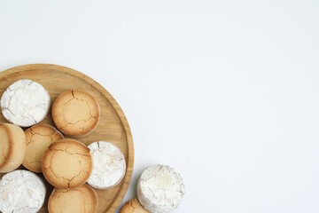Sweet homemade tasty cookies on white background, top view