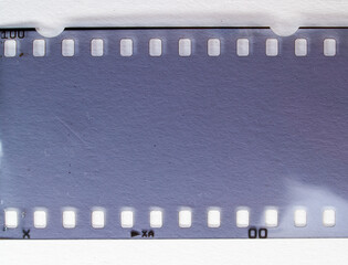 bad developed black and white film material on white background.