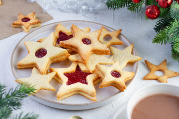 Fototapeta na wymiar Linzer cookies for Christmas on a plate