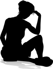 A silhouette woman looking relaxed sitting on the floor or ground thinking
