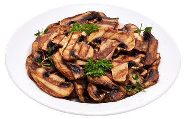 Grilled Slices of champignon mushrooms with stripes from a grill in ceramic plate