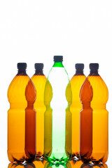 Ecological Concepts. Various Empty Colorful Plastic Garbage Bottles In Line Together Over White Background.