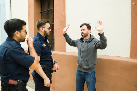 Police officer making an arrest of a criminal suspect