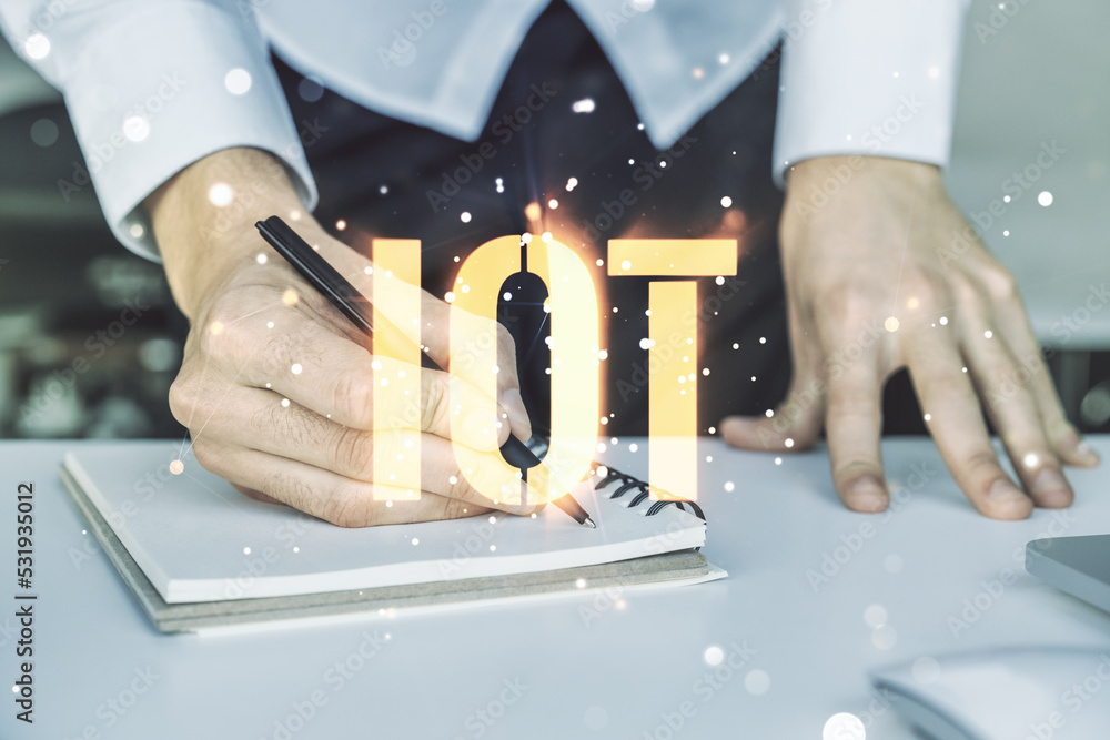 Poster double exposure of creative iot hologram with hand writing in notebook on background with laptop, re