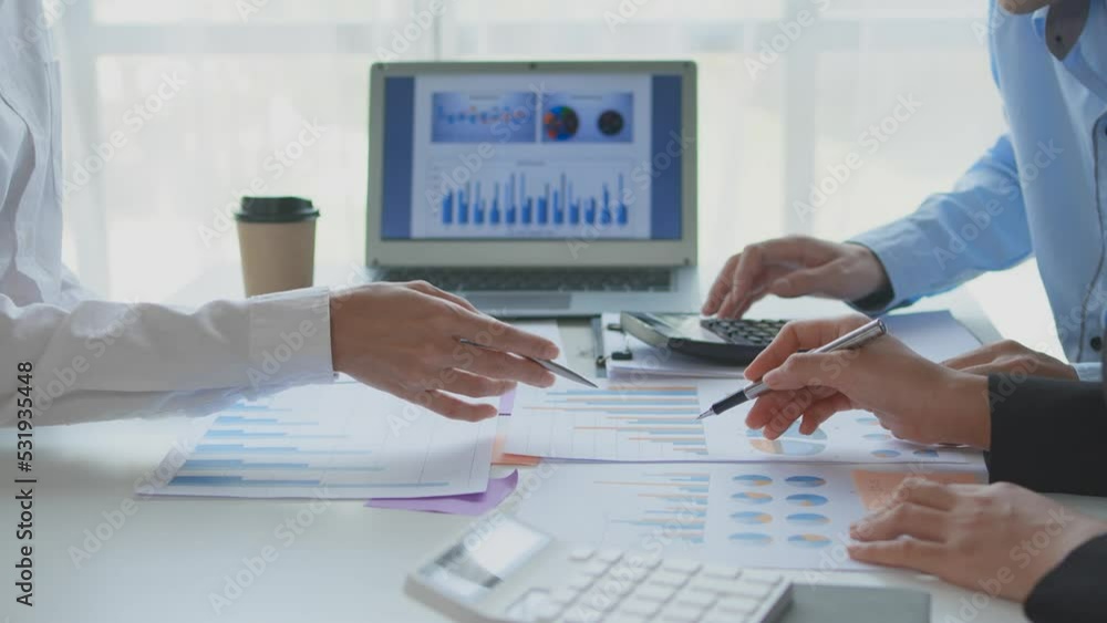 Poster business people pointing graph and using calculator during business meeting. business team meeting a