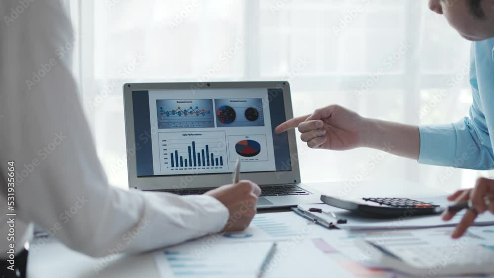 Poster business people pointing graph and using calculator during business meeting. business team meeting a