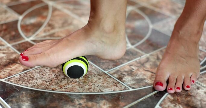 Step on massage ball and relieve plantar fasciitis or heel pain