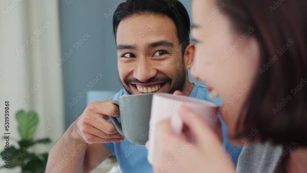 Wall mural Couple, love and happy with a man and woman laughing, kissing and drinking coffee together in their home. A montage of romance with a male and female bonding, being romantic and positive in a bedroom