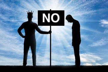 Selfishness. Selfish man with a crown on his head, holding a poster with the word no and an upset...