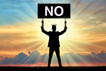 Selfishness. Selfish man with a crown on his head, holding a poster with the word no.