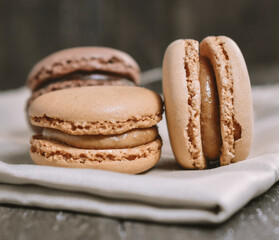
Sweet macaroons on wooden Table Background