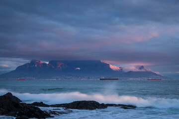 View of Table Mountain at dusk from Bloubergstrand, Cape Town. Western Cape. South Africa. 