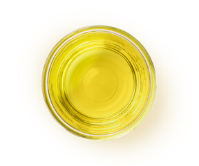 Olive oil in glass bowl isolated on white background with clipping path, top view, flat lay.