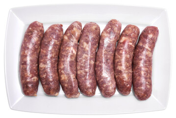 Raw beef or pork grill sausage on ceramic plate isolated