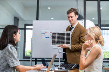 Business person meeting on solar cell panel technology. Business People Discussing Solar Power...