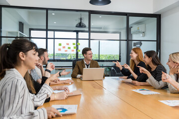 Diverse colleagues gather in brainstorm discuss statistics together. Group of people colleagues gather doing Brainstorming business plan together. Team Brainstorm Working Concept.