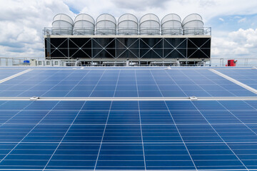 Hot climate and Sets of cooling towers cause increased power production,Alternative energy to conserve the world's energy, rooftop solar and cooling systems.